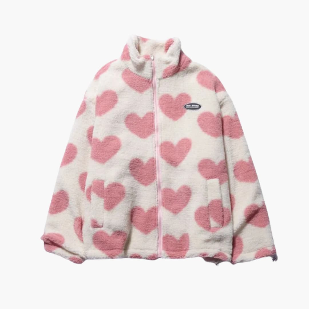Stay cozy and chic with this reversible coat featuring a unique heart detail, perfect for layering.