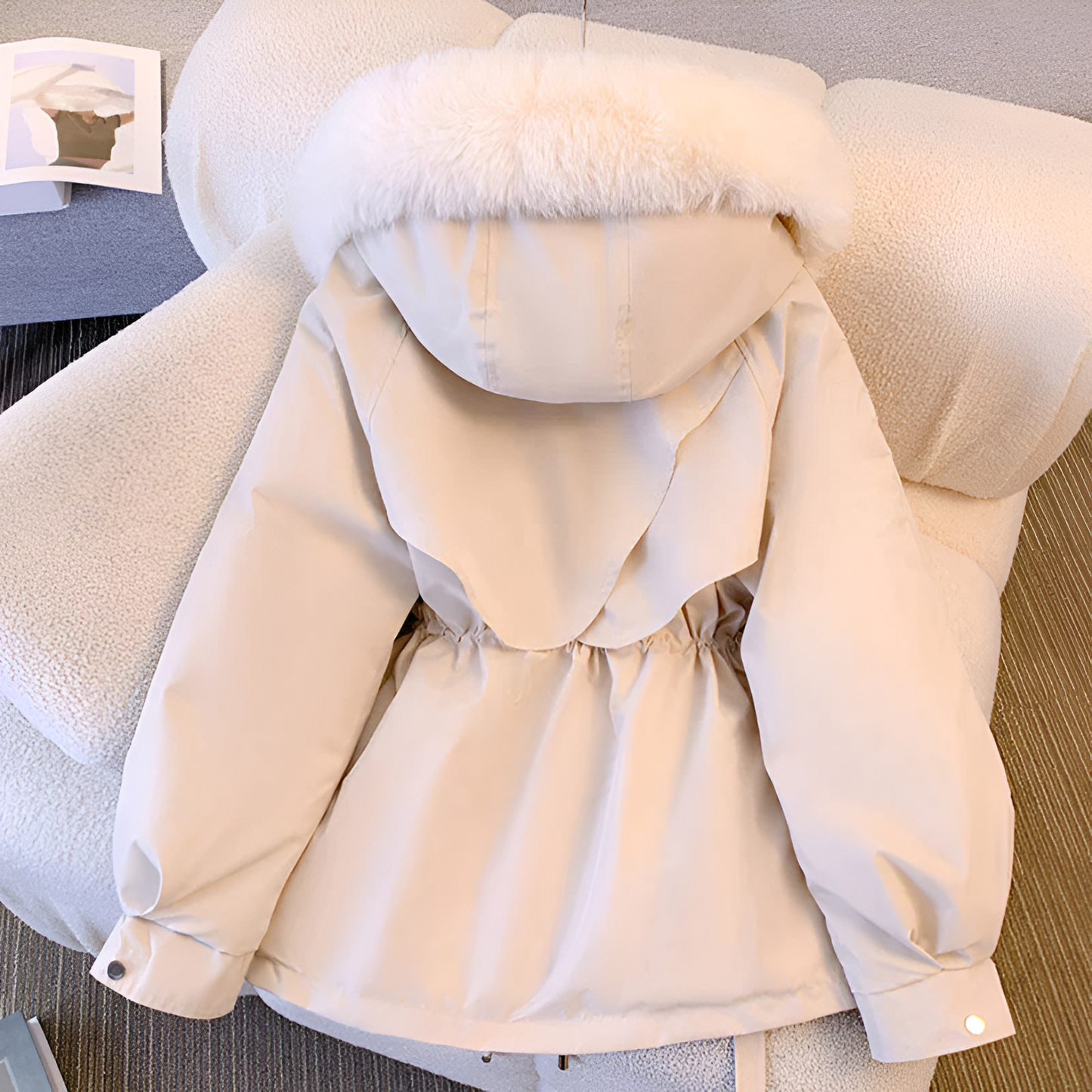 Back View of the Nicole winter coat with water-resistant fabric to keep you dry during rain and snow.
