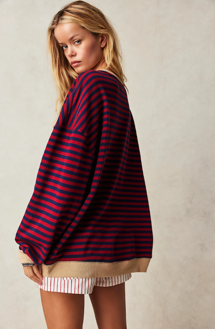 Model wearing the Mana Striped Oversized Sweater for all-day comfort.