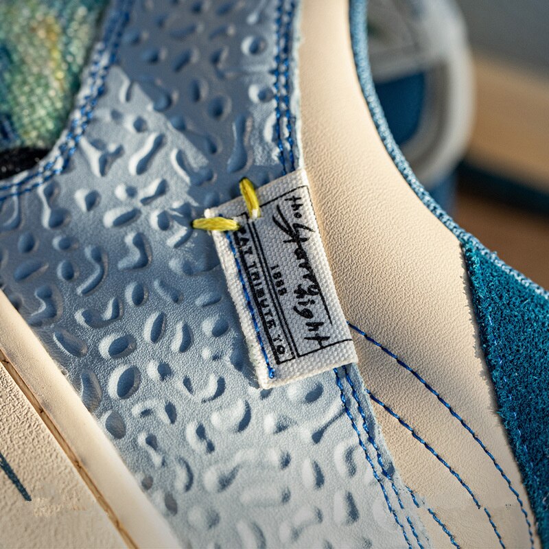 Close-up of the intricate details on Van Gogh Starry Night sneakers, featuring high-quality materials.