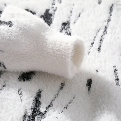 Close-up of the soft, fluffy texture of the Blake™ Textured Pullover, perfect for snuggling during cold weather.