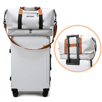 Travel duffle bag in with a convenient luggage sleeve, easily attaching to a suitcase for effortless travel.