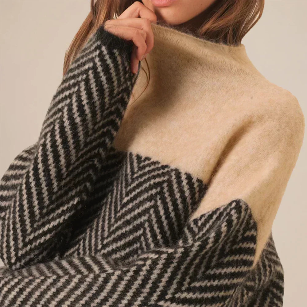 Elevate your wardrobe with this beige turtleneck sweater, designed for comfort and sophisticated style.