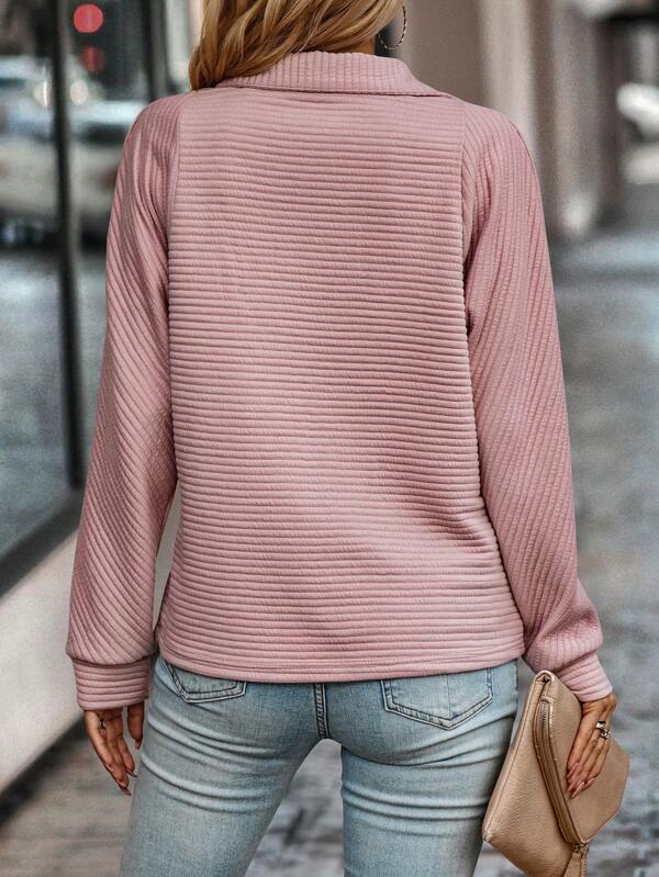 Add sophistication to your wardrobe with this V-neck sweater, perfect for both work and weekend wear.