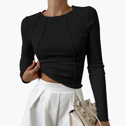 Chic long-sleeved top perfect for both casual and formal occasions.