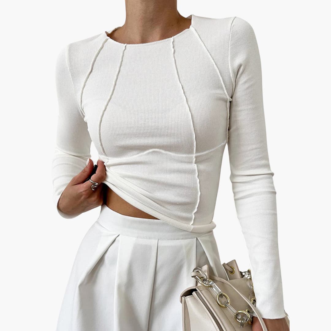 Stylish white long-sleeved top with a figure-hugging fit.